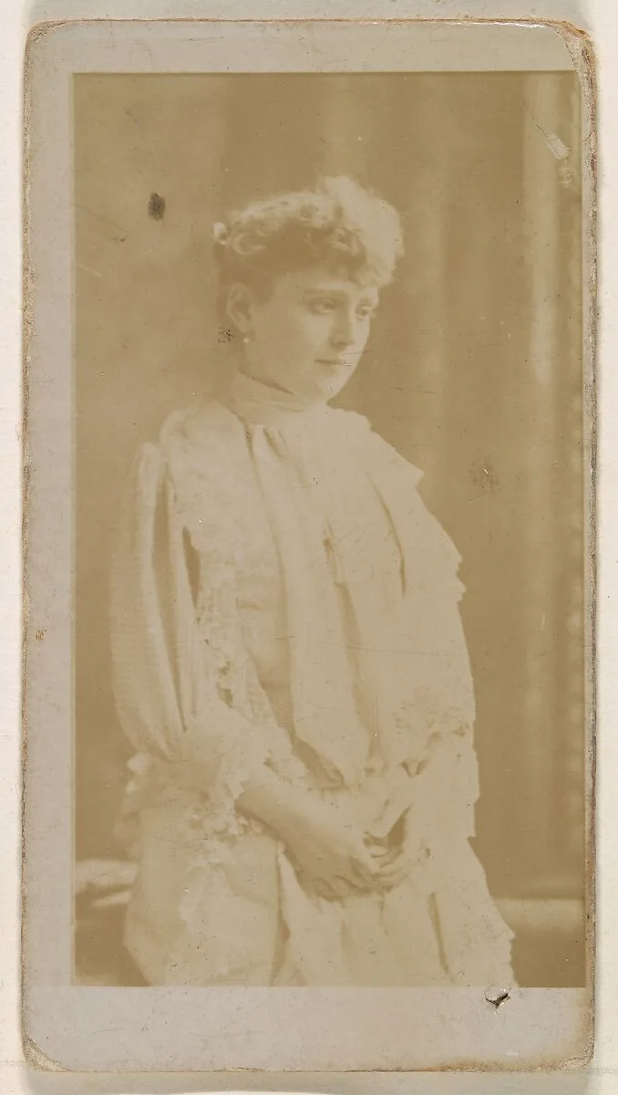 Actress in profile dressed in white gown, from the Actresses series (N245) issued by Kinney Brothers to promote Sweet Caporal Cigarettes — Kinney Brothers Tobacco Company