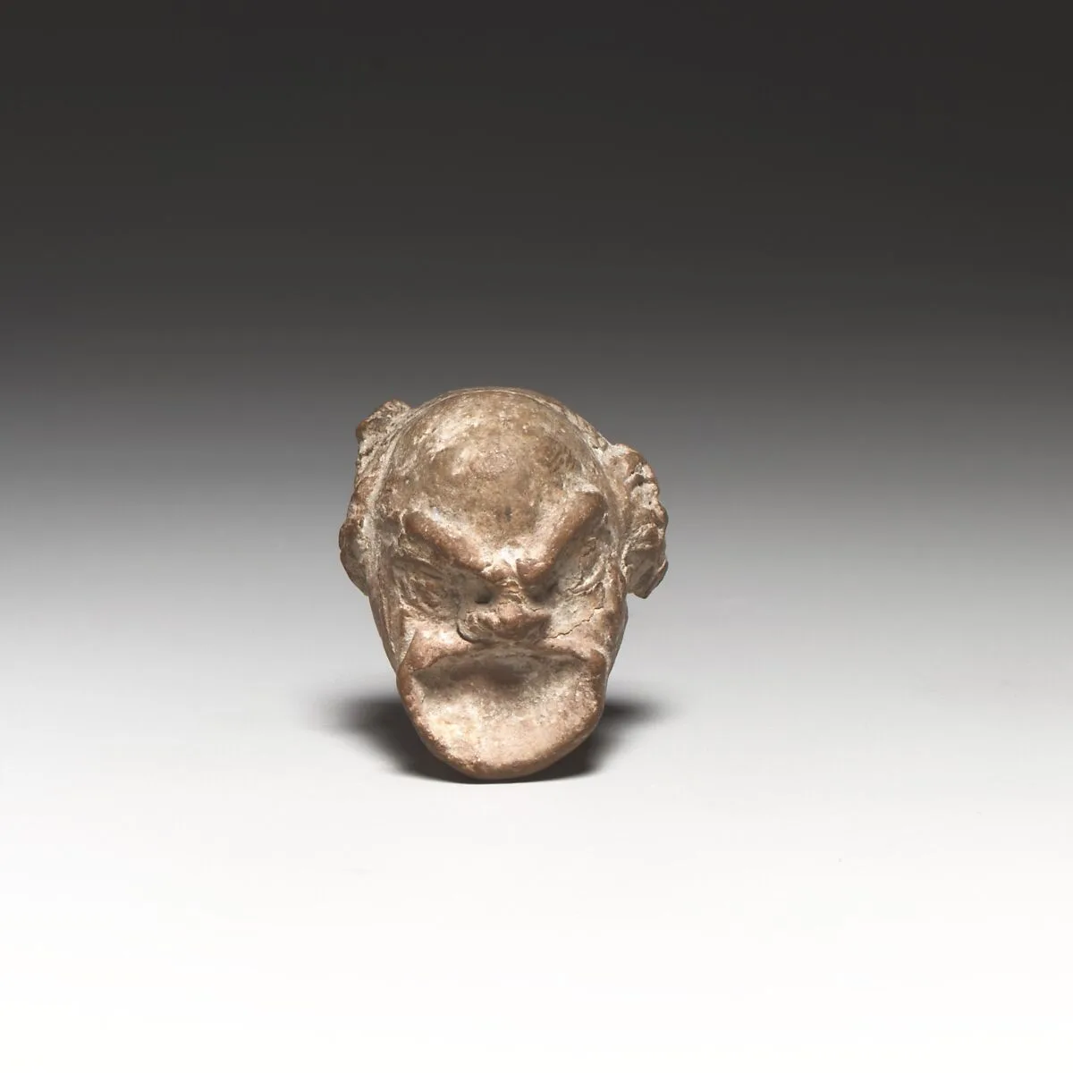 Head of a comic figurine — Unknown