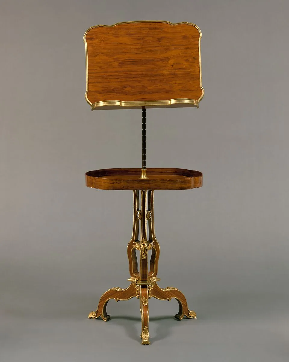 Adjustable reading and writing table (pupitre à crémaillère, servant de table) — Martin Carlin