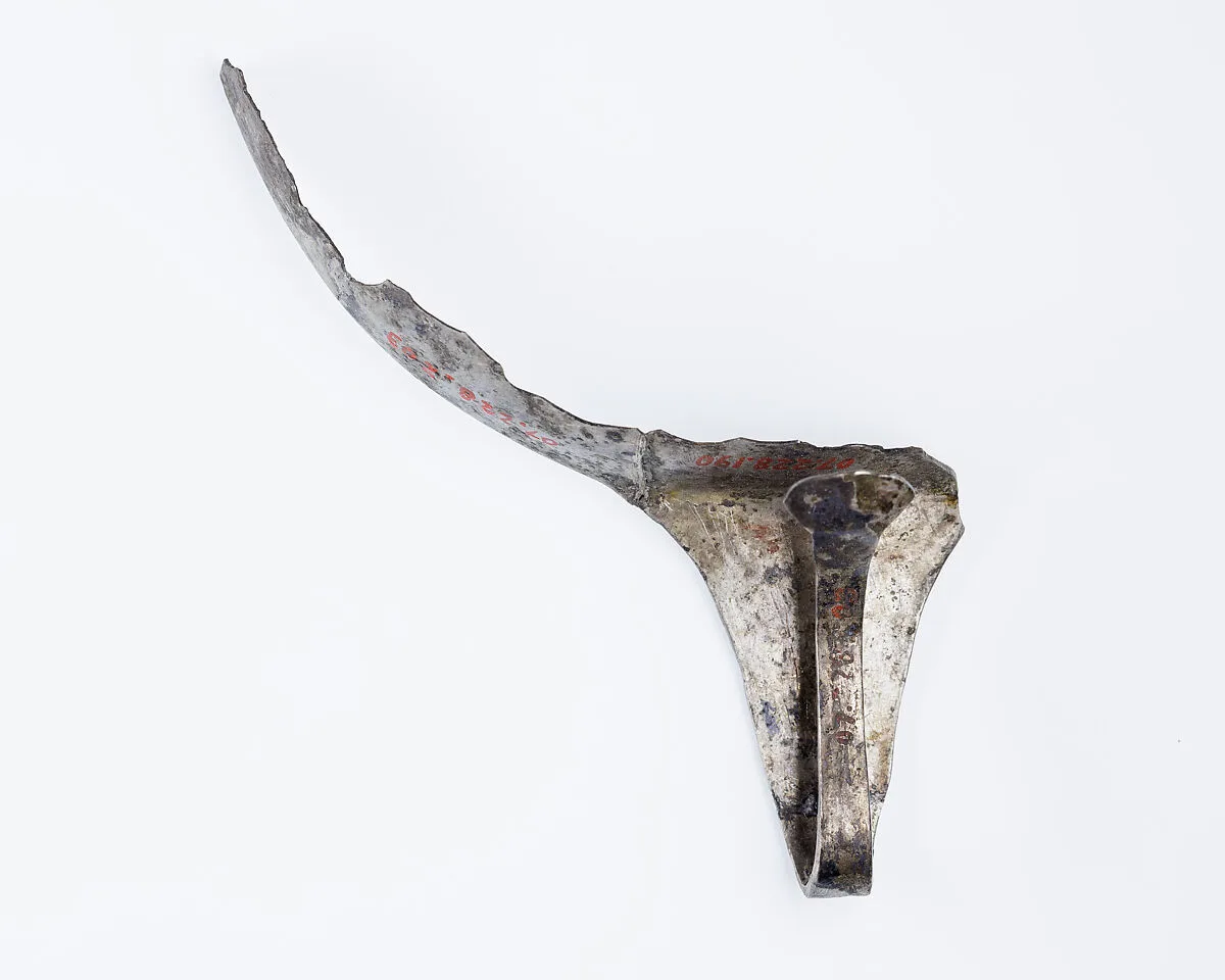 Rim fragment with lotus handle from a shallow strainer — Unknown