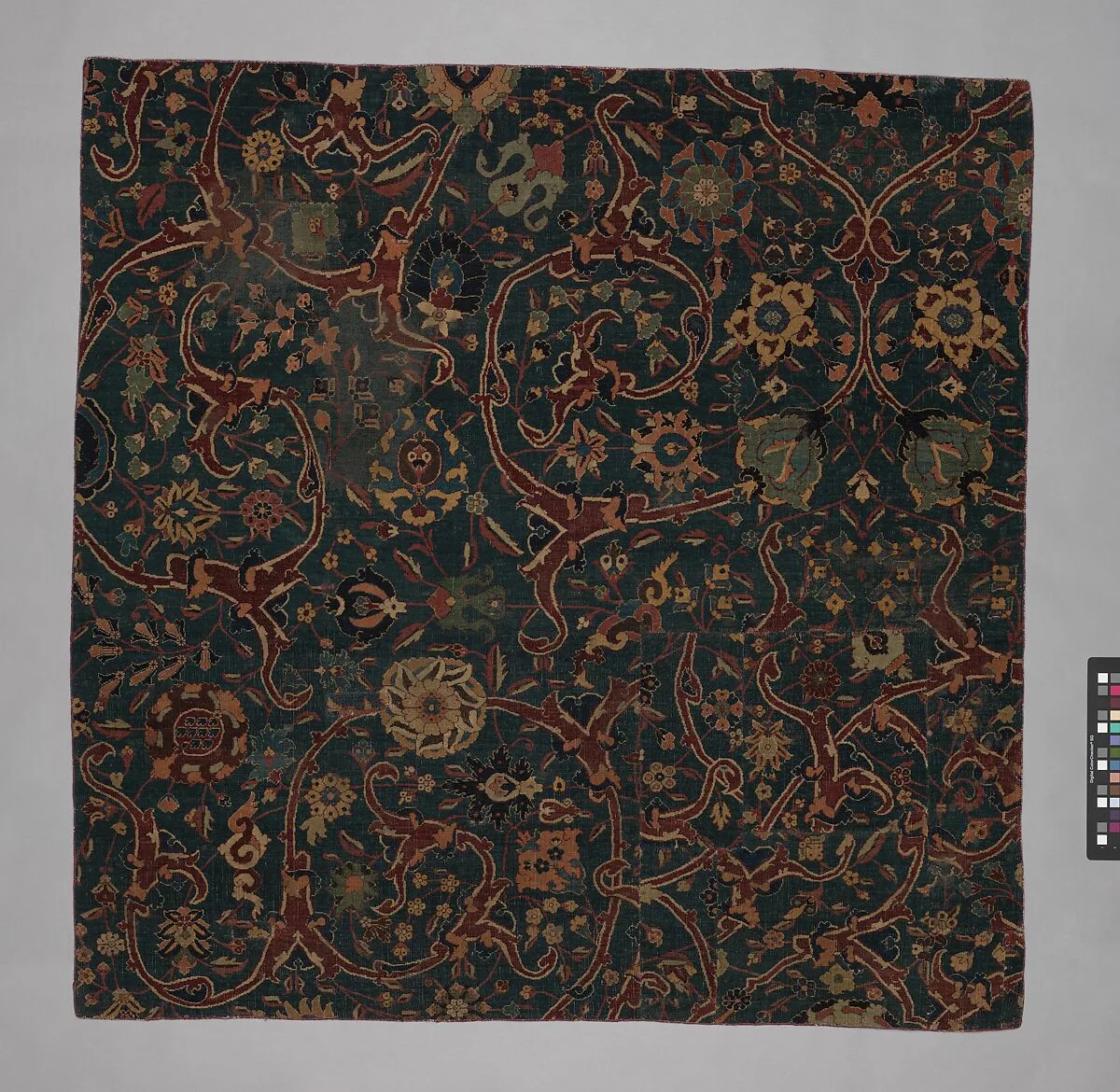 Blue-ground Carpet Fragment with Scrolling Floral Vines — Unknown