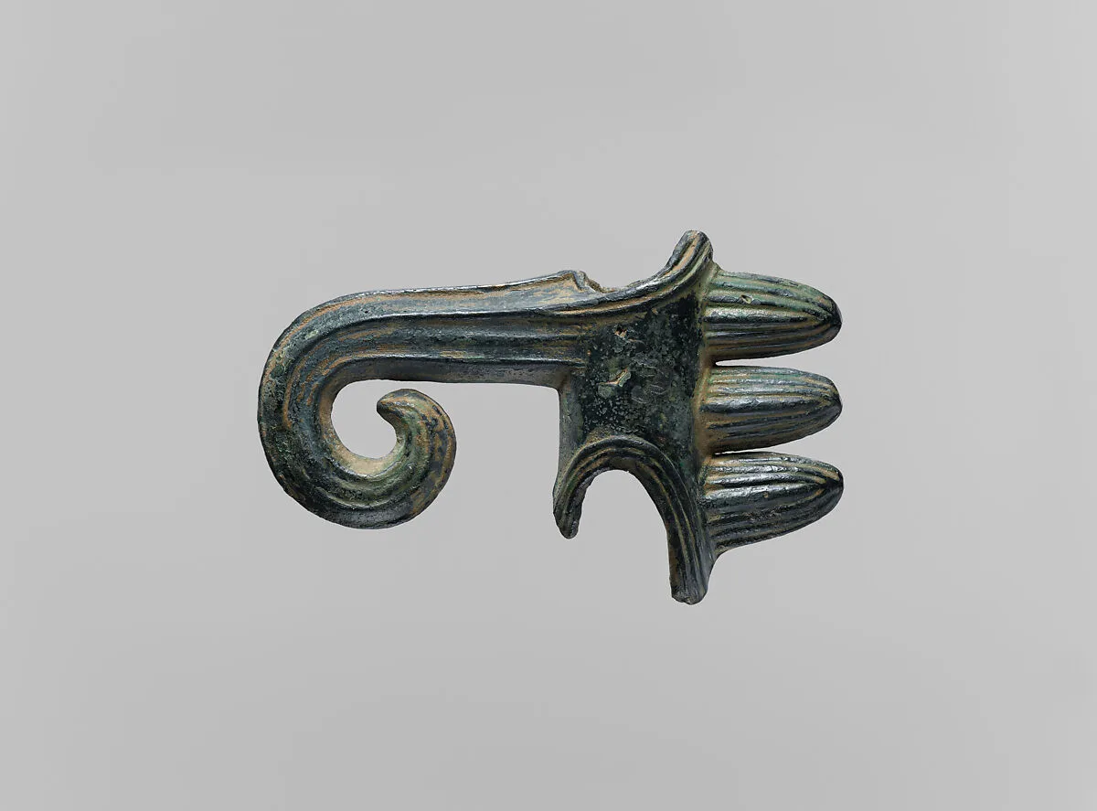 Shaft-hole axe head with voluted blade — Unknown
