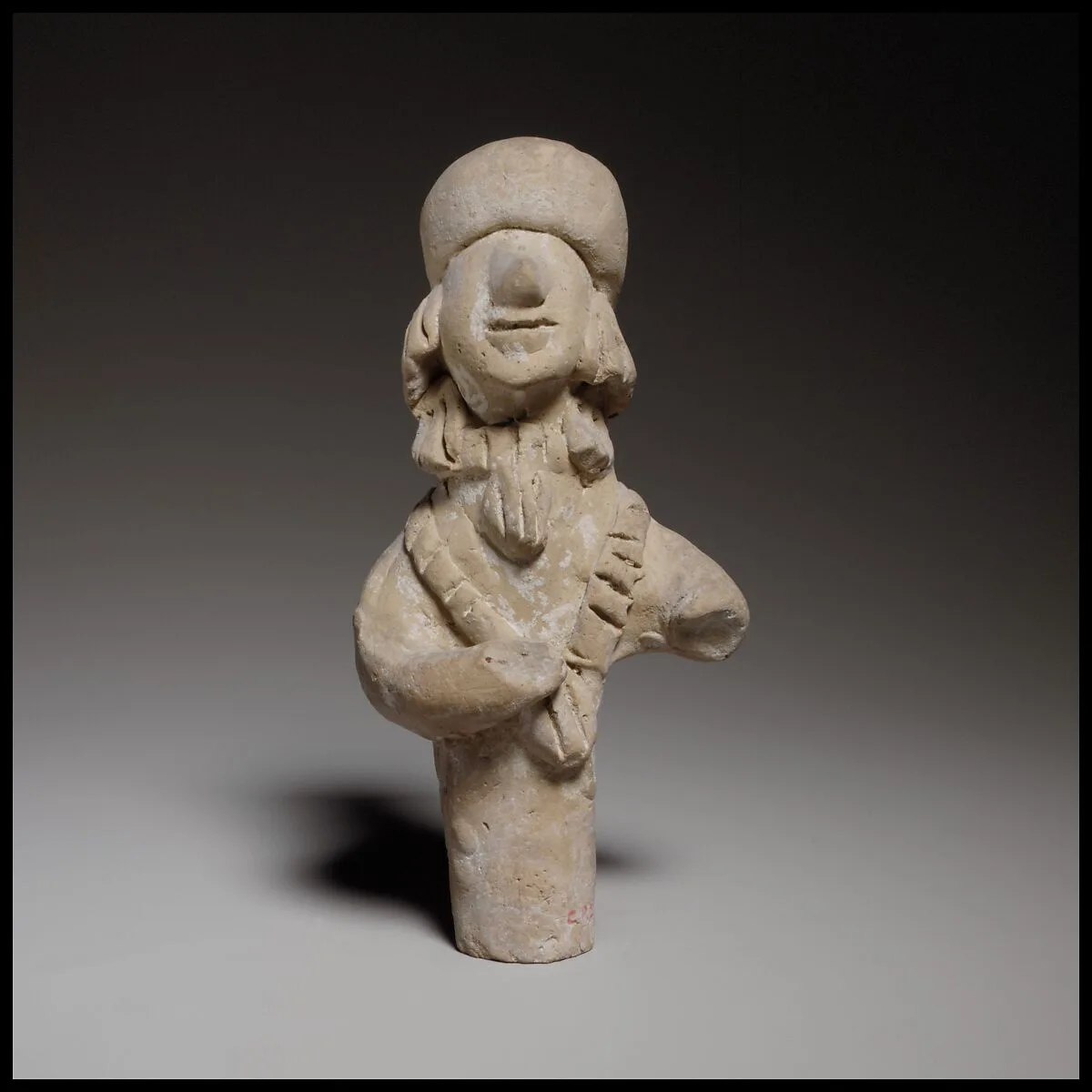Terracotta statuette of a woman — Unknown