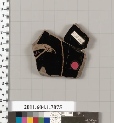 Terracotta fragment of a kylix (drinking cup)