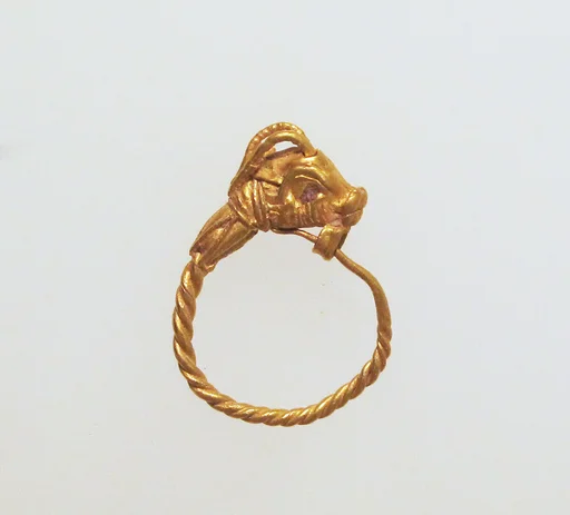 Gold earring with head of a goat