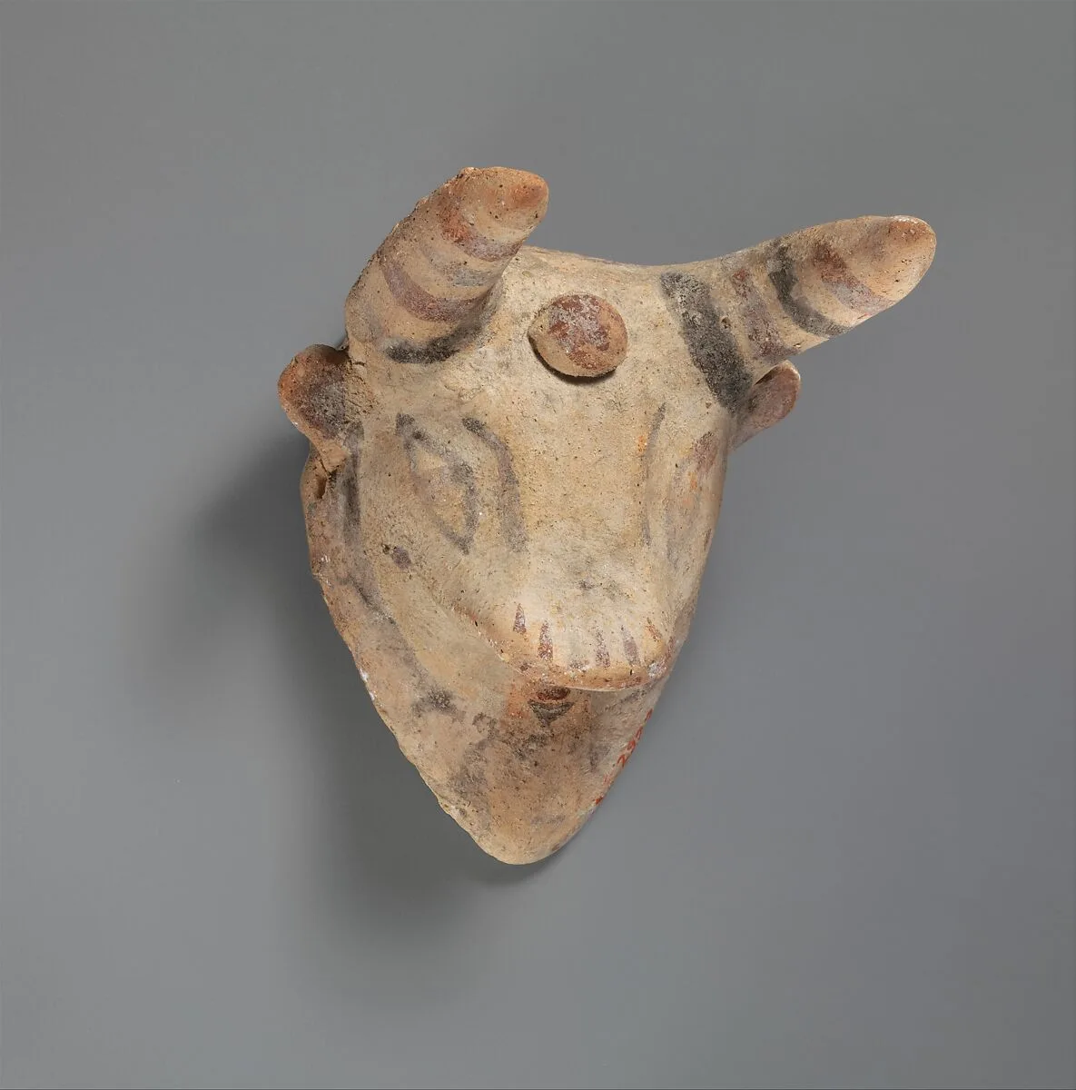 Terracotta bull's mask — Unknown