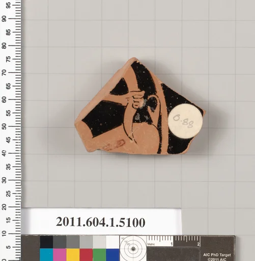 Terracotta fragment of a kylix (drinking cup)