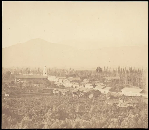 [Town on Plain with Mountain in Background]