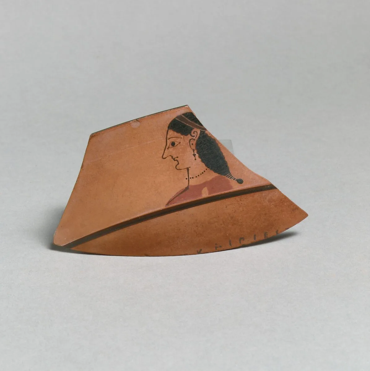 Fragment of a terracotta kylix: lip-cup (drinking cup) — Sakonides