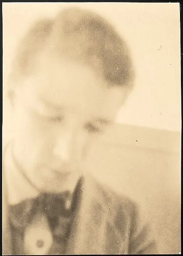 [Self-Portrait in Mirror, Looking Down into Camera Viewfinder]