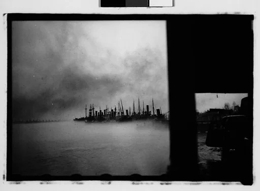 [Ships in Foggy Harbor with Parked Car and Landing Pier in Foreground, New Orleans Vicinity, Louisiana]