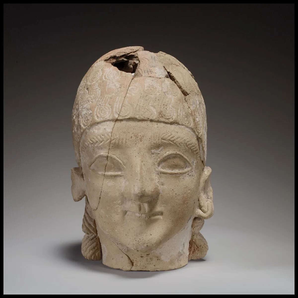 Male head — Unknown