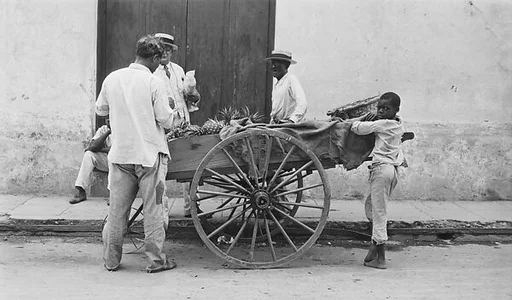 [Pineapple Vendor and Men Around Cart, Havana]