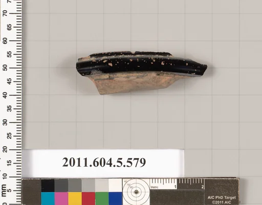 Terracotta fragment of a stemless kylix (drinking cup)