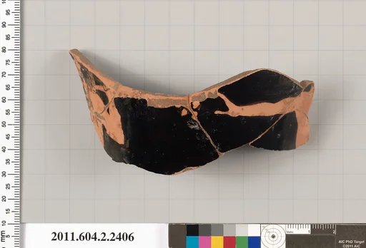 Terracotta fragment of a head kantharos (drinking cup with high handles)?
