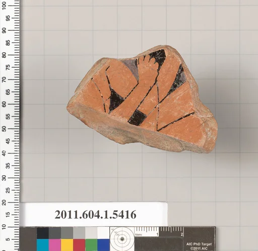 Terracotta fragment of a kylix (drinking cup)