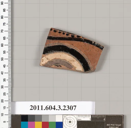 Terracotta fragment of a kylix: eye-cup (drinking cup)