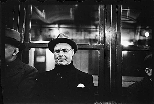 [Five 35mm Film Frames: Subway Passengers, Times Square Shuttle, New York City: Man with Eyes Shut, Young Woman in Hat Seated Between Two Men, Old Woman in Hat and Spectacles]