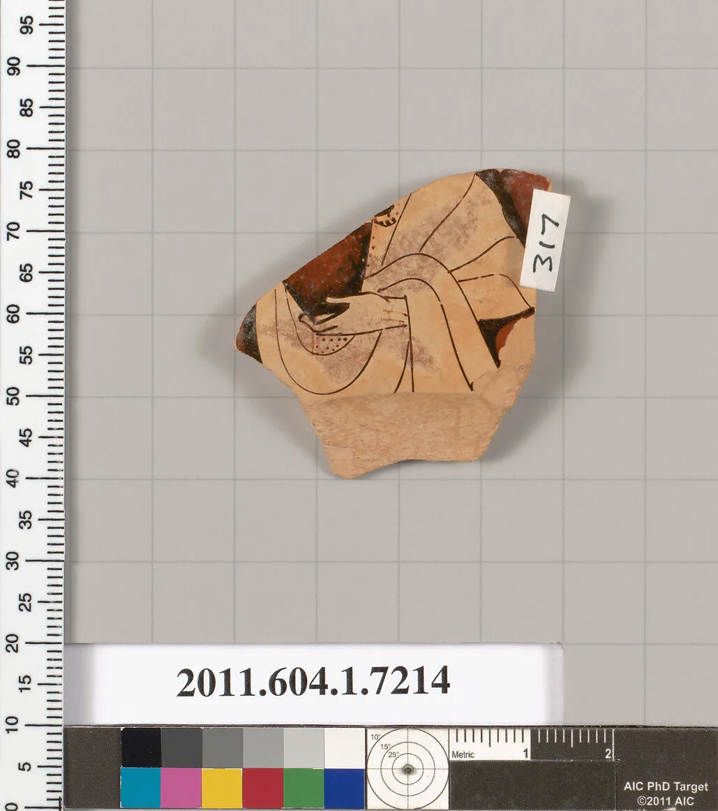 Terracotta fragment of a kylix (drinking cup) — Makron