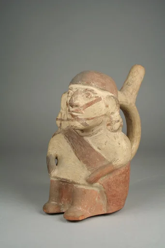 Stirrup Spout Bottle with Seated Figure