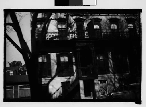 [Cast-Iron Balconies and Elevated Entry Porch of Italianate Town House, From Automobile, Savannah, Georgia]