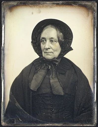 [Elderly Woman in Black Cape and Bonnet with Mourning Crape]