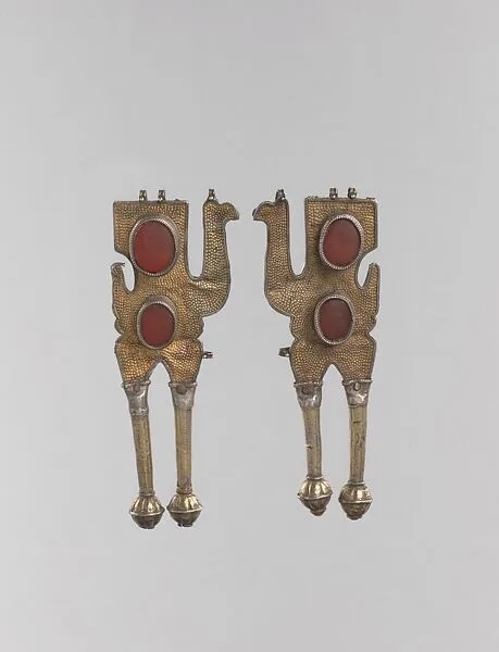 Boy's Amulet in the Shape of Camels, One of a Pair — Unknown