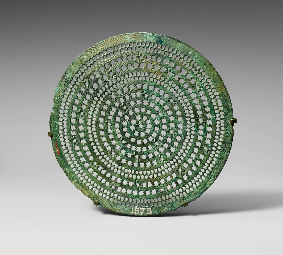 Bronze perforated disc — Unknown