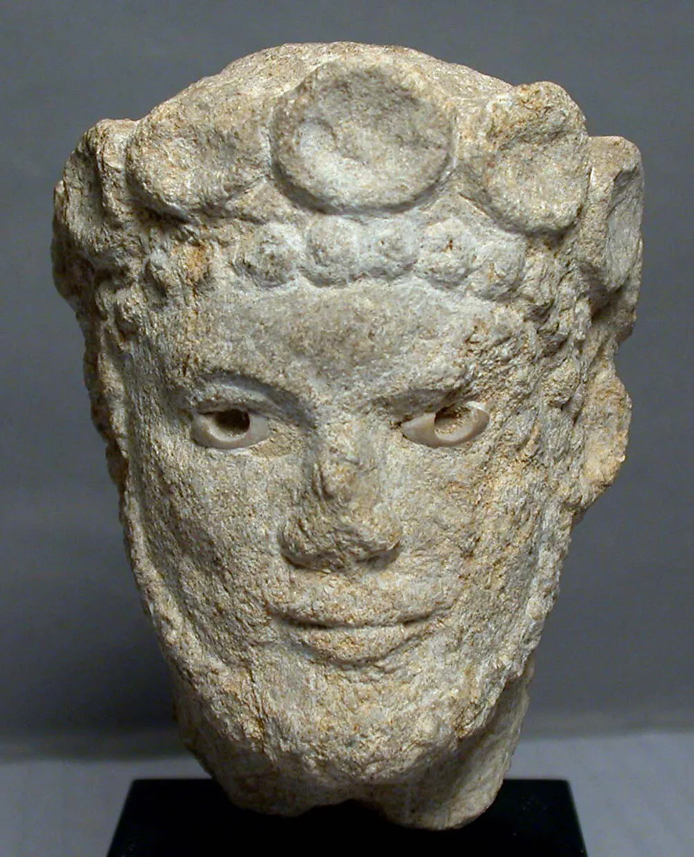 Limestone head of a bearded man — Unknown