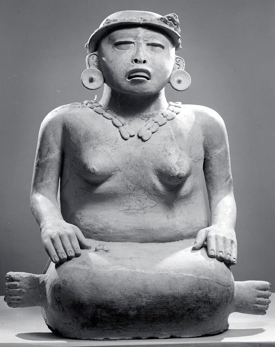 Seated Female Figure — Unknown
