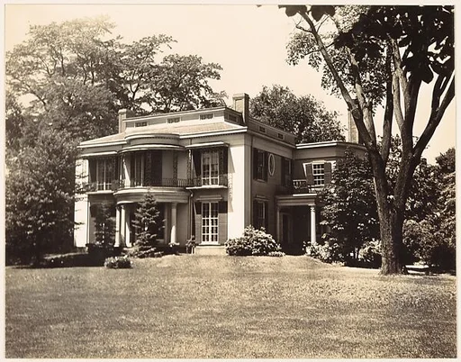 [Two Story House with Rounded Balcony, Seen from Across Lawn, Cambridge, Massachusetts]