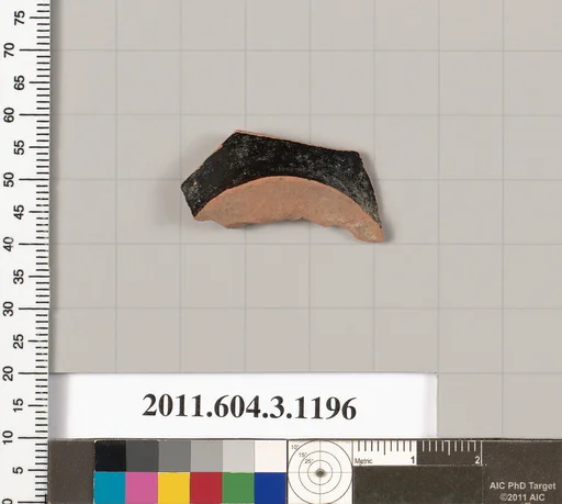 Terracotta fragment of a mastoid (drinking cup with narrow base)