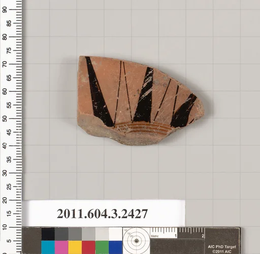 Terracotta fragment of a kylix: eye-cup (drinking cup)