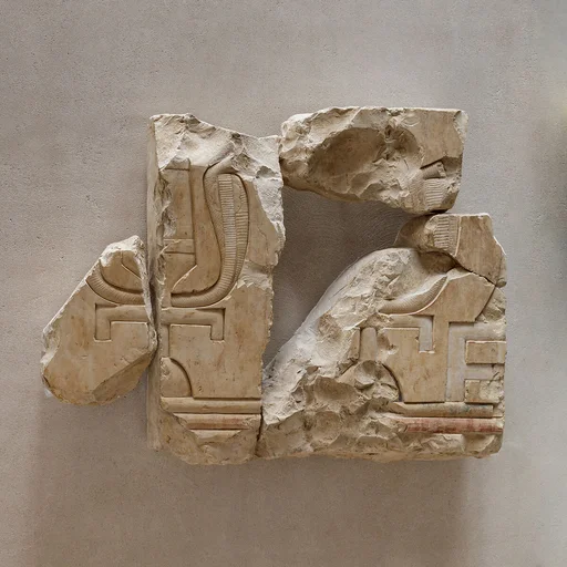 Relief fragments of two sacred emblems