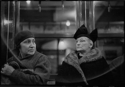 [Five 35mm Film Frames: Subway Passengers, New York City: Elderly Women, Man Reading Newspaper, Man in Bowler Hat]