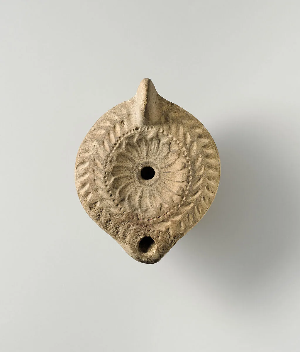 Terracotta oil lamp — Unknown