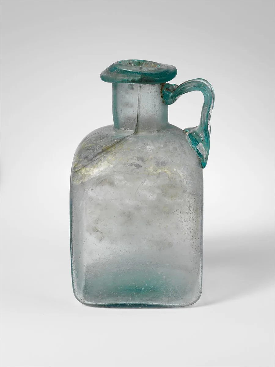 Glass square bottle — Unknown