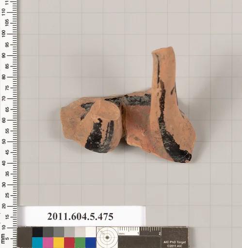Terracotta fragment of a kylix (drinking cup)