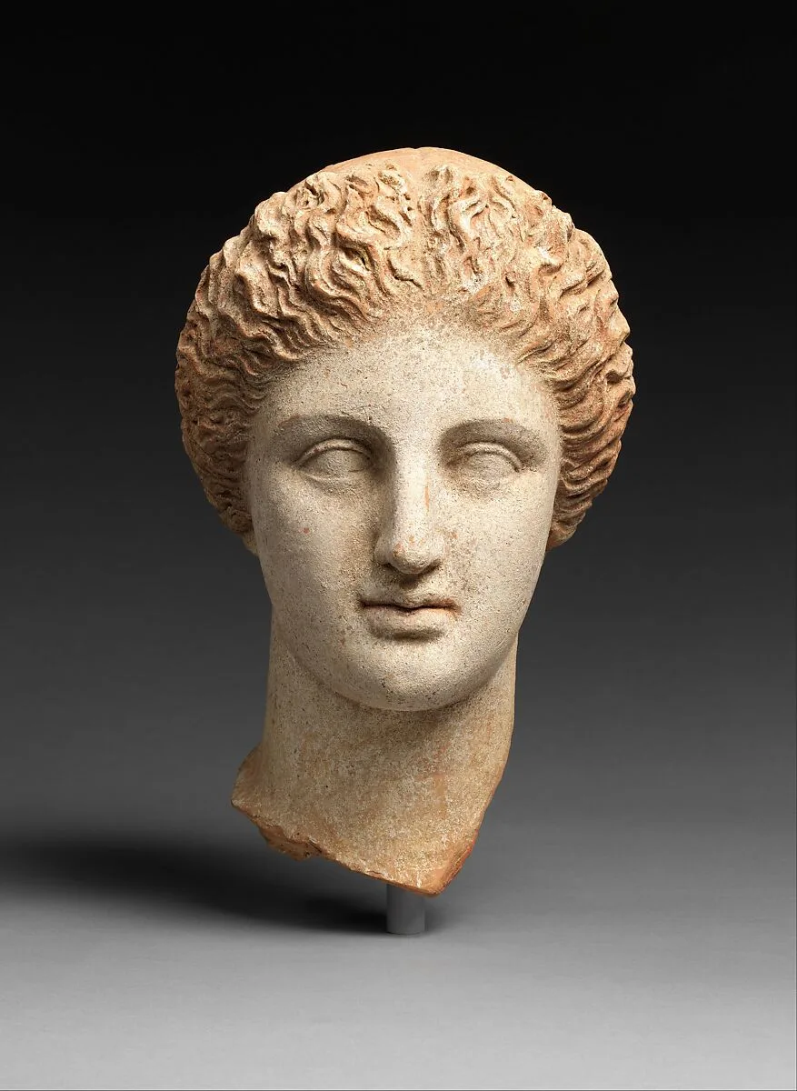 Terracotta head of a woman — Unknown