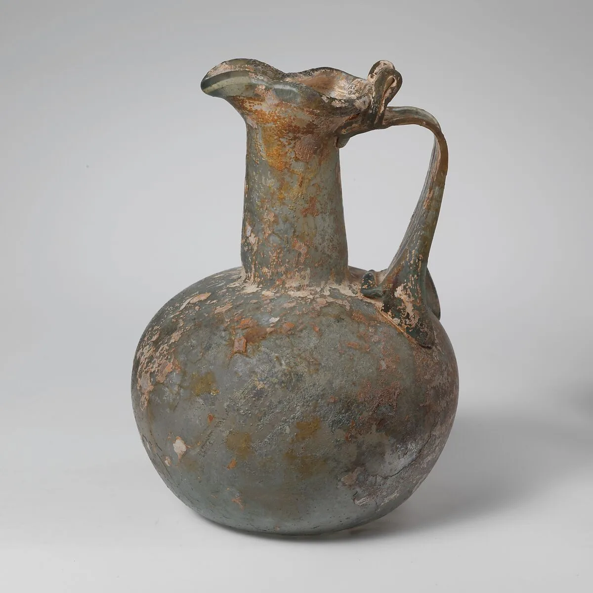 Glass jug with trefoil rim — Unknown
