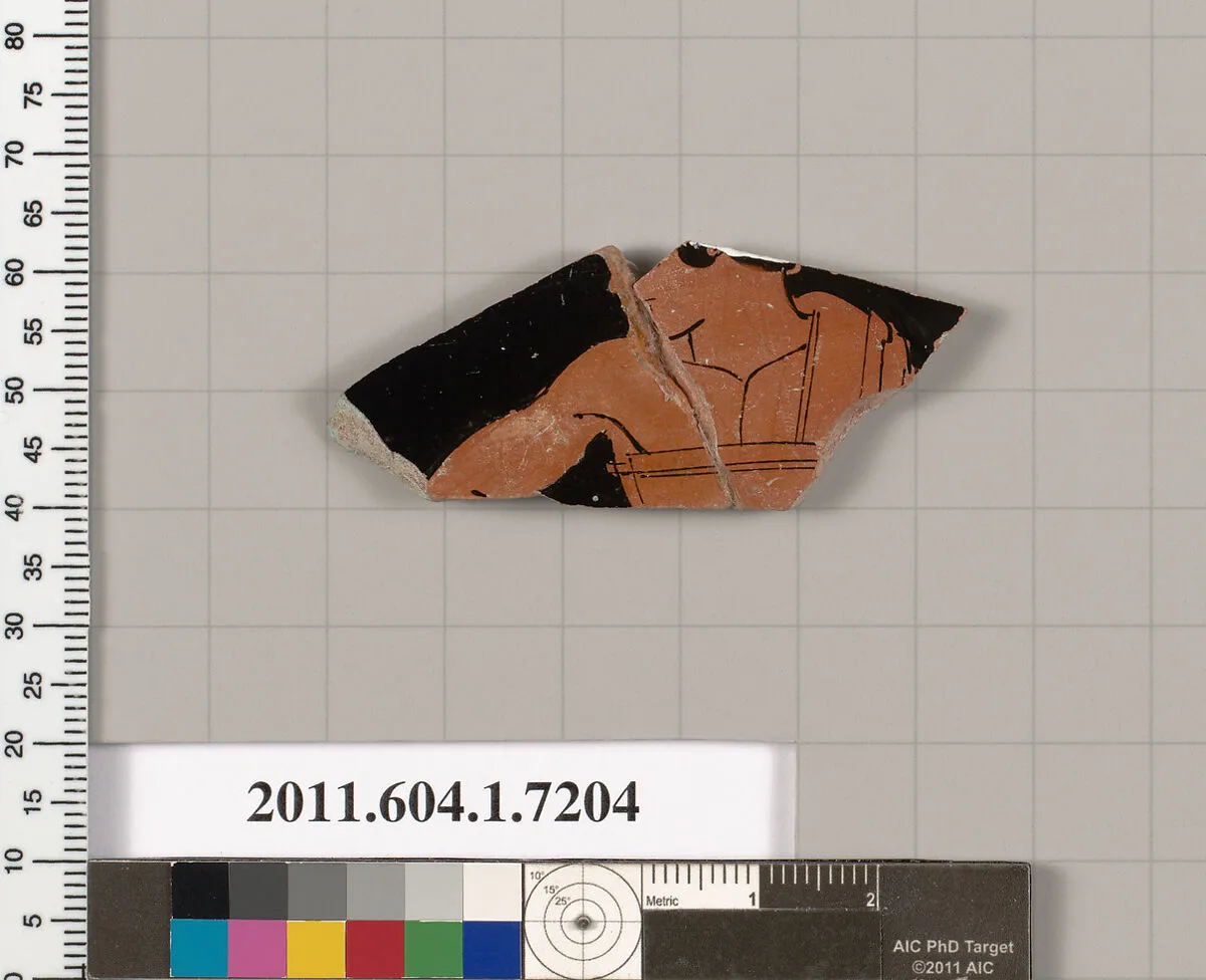 Terracotta fragment of a kylix (drinking cup) — Makron