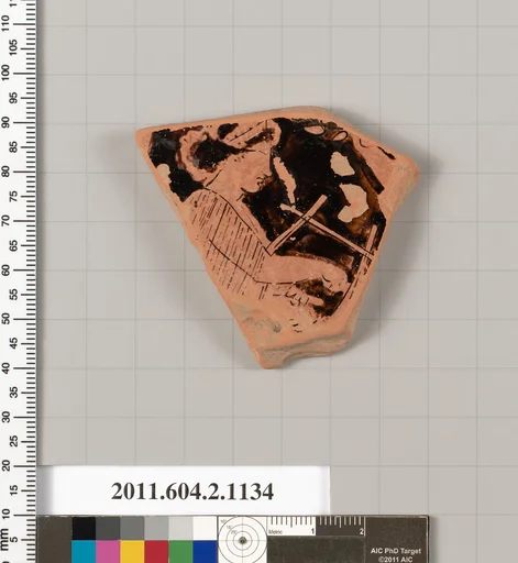 Terracotta fragment of a lekanis lid (covered dish)