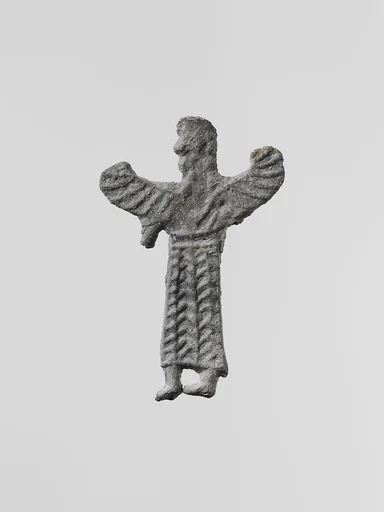 Lead figure of a winged goddess, possibly Artemis Orthia