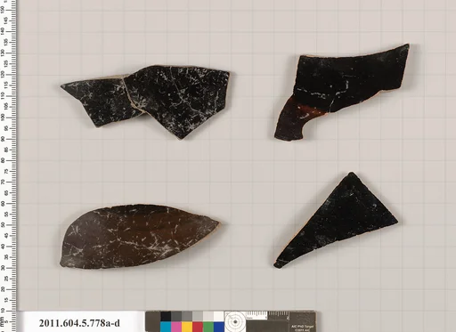 Terracotta fragments of kylikes (drinking cups)