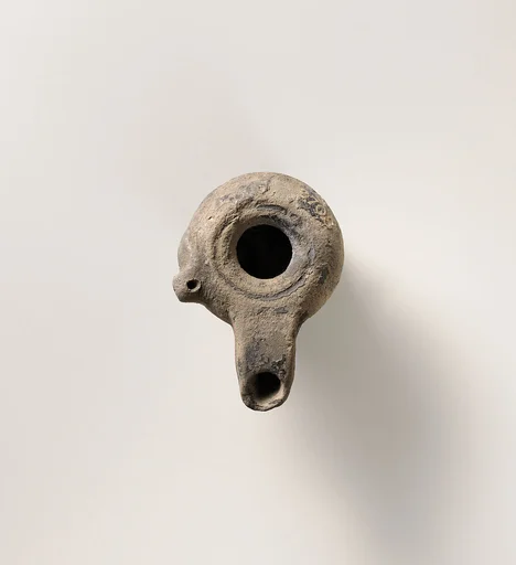 Terracotta oil lamp