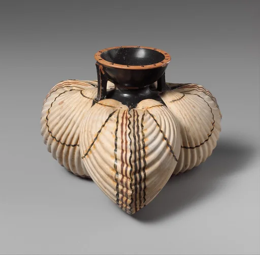 Terracotta aryballos (oil flask) in the form of three cockleshells