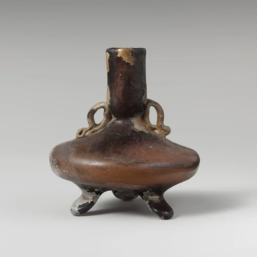 Glass bottle with three feet