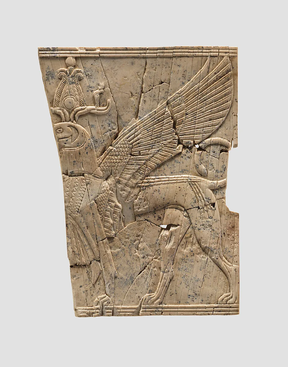 Furniture plaque carved in relief with a winged, falcon-headed sphinx — Unknown