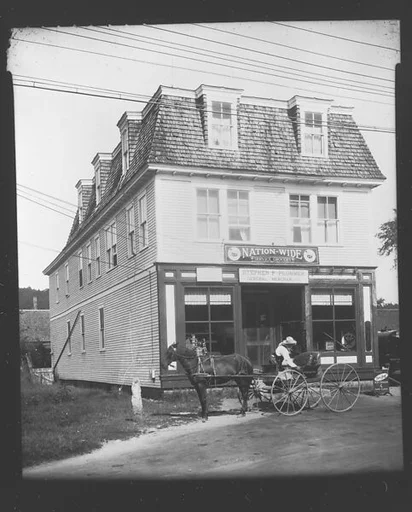 [Horse-Drawn Carriage in Front of General Store and Post Office, Plainfield, New Hampshire]