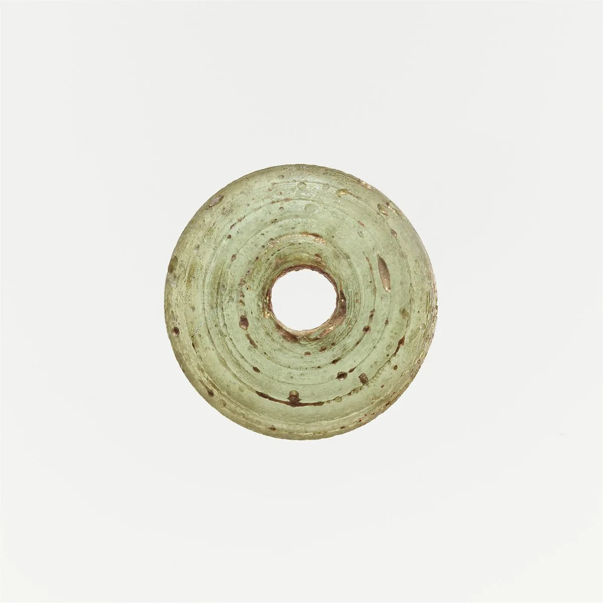 Glass spindle whorl — Unknown